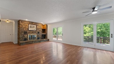 Two fireplaces, two living areas, and tons of bonus space--this on Bella Vista Country Club - Scottsdale in Arkansas - for sale on GolfHomes.com, golf home, golf lot