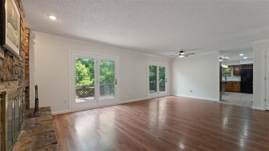 Two fireplaces, two living areas, and tons of bonus space--this on Bella Vista Country Club - Scottsdale in Arkansas - for sale on GolfHomes.com, golf home, golf lot