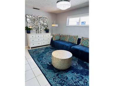 Modern Luxe Sanctuary in Sunrise. Step into your private oasis on Sunrise Lakes Phase III in Florida - for sale on GolfHomes.com, golf home, golf lot
