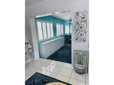 Modern Luxe Sanctuary in Sunrise. Step into your private oasis on Sunrise Lakes Phase III in Florida - for sale on GolfHomes.com, golf home, golf lot