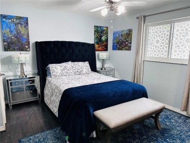 Modern Luxe Sanctuary in Sunrise. Step into your private oasis on Sunrise Lakes Phase III in Florida - for sale on GolfHomes.com, golf home, golf lot