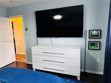 Modern Luxe Sanctuary in Sunrise. Step into your private oasis on Sunrise Lakes Phase III in Florida - for sale on GolfHomes.com, golf home, golf lot