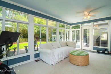 This house is a must see. Beautiful sunroom with lots of natural on Timuquana Country Club in Florida - for sale on GolfHomes.com, golf home, golf lot