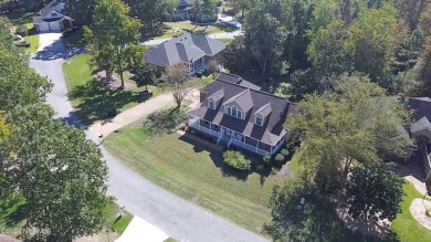 Come see this beautiful brick home in a prime convenient on Sound Golf Links at Albemarle Plantation in North Carolina - for sale on GolfHomes.com, golf home, golf lot