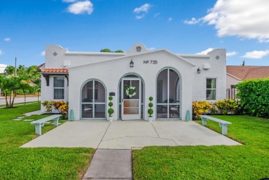 Step into this 1927 West Palm Beach treasure, meticulously on West Palm Beach Golf Course in Florida - for sale on GolfHomes.com, golf home, golf lot