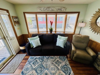 2 BED/2 BATH BEACH HOUSE IN OCEAN LAKES WITH WRAPAROUND COVERED on Prestwick Country Club in South Carolina - for sale on GolfHomes.com, golf home, golf lot
