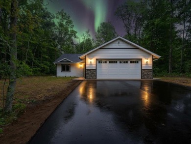 Check out this modern new home built by K Ecklund Construction on Deacons Lodge Golf Course in Minnesota - for sale on GolfHomes.com, golf home, golf lot