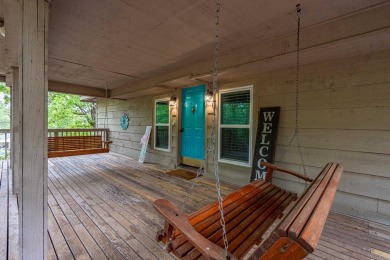 Wake up to stunning water views and a lush, private landscape in on Diamondhead Golf and Country Club in Arkansas - for sale on GolfHomes.com, golf home, golf lot