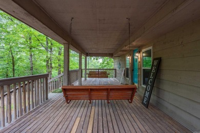 Wake up to stunning water views and a lush, private landscape in on Diamondhead Golf and Country Club in Arkansas - for sale on GolfHomes.com, golf home, golf lot