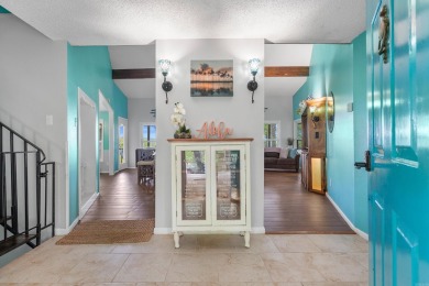 Wake up to stunning water views and a lush, private landscape in on Diamondhead Golf and Country Club in Arkansas - for sale on GolfHomes.com, golf home, golf lot