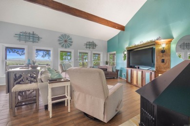 Wake up to stunning water views and a lush, private landscape in on Diamondhead Golf and Country Club in Arkansas - for sale on GolfHomes.com, golf home, golf lot