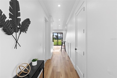 Experience contemporary living in this BRAND-NEW 2025 two-story on Saint Andrews South Golf Club in Florida - for sale on GolfHomes.com, golf home, golf lot