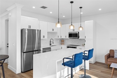 Experience contemporary living in this BRAND-NEW 2025 two-story on Saint Andrews South Golf Club in Florida - for sale on GolfHomes.com, golf home, golf lot