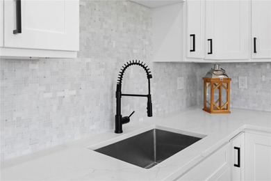 Experience contemporary living in this BRAND-NEW 2025 two-story on Saint Andrews South Golf Club in Florida - for sale on GolfHomes.com, golf home, golf lot