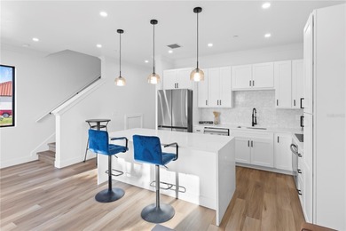 Experience contemporary living in this BRAND-NEW 2025 two-story on Saint Andrews South Golf Club in Florida - for sale on GolfHomes.com, golf home, golf lot