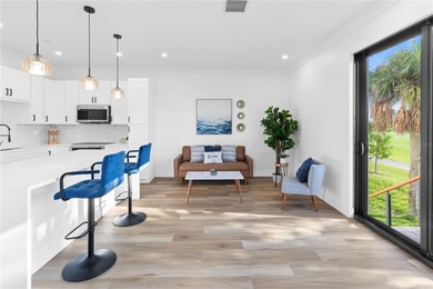 Experience contemporary living in this BRAND-NEW 2025 two-story on Saint Andrews South Golf Club in Florida - for sale on GolfHomes.com, golf home, golf lot