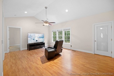 Step inside this charming 3-bedroom, 2-bath home featuring a on Carolina Lakes Country Club in North Carolina - for sale on GolfHomes.com, golf home, golf lot