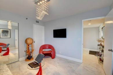 Beautiful corner unit, completely renovated, impact windows 3/8 on Marina Lakes Golf Course in Florida - for sale on GolfHomes.com, golf home, golf lot