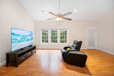 Step inside this charming 3-bedroom, 2-bath home featuring a on Carolina Lakes Country Club in North Carolina - for sale on GolfHomes.com, golf home, golf lot