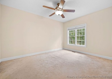 Step inside this charming 3-bedroom, 2-bath home featuring a on Carolina Lakes Country Club in North Carolina - for sale on GolfHomes.com, golf home, golf lot