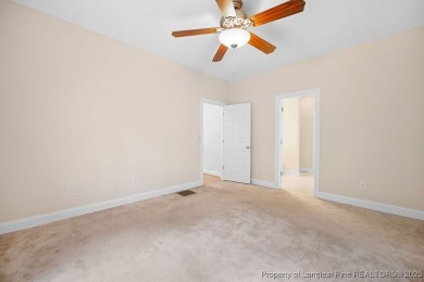 Step inside this charming 3-bedroom, 2-bath home featuring a on Carolina Lakes Country Club in North Carolina - for sale on GolfHomes.com, golf home, golf lot