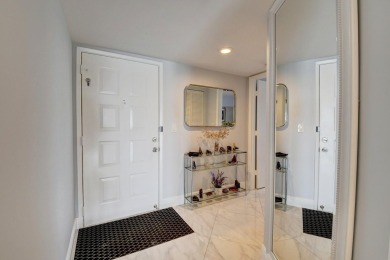 Beautiful corner unit, completely renovated, impact windows 3/8 on Marina Lakes Golf Course in Florida - for sale on GolfHomes.com, golf home, golf lot