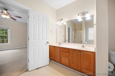 Step inside this charming 3-bedroom, 2-bath home featuring a on Carolina Lakes Country Club in North Carolina - for sale on GolfHomes.com, golf home, golf lot