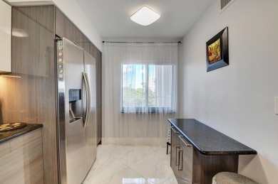 Beautiful corner unit, completely renovated, impact windows 3/8 on Marina Lakes Golf Course in Florida - for sale on GolfHomes.com, golf home, golf lot