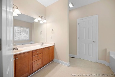 Step inside this charming 3-bedroom, 2-bath home featuring a on Carolina Lakes Country Club in North Carolina - for sale on GolfHomes.com, golf home, golf lot