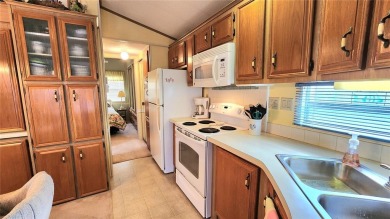 START ENJOYING FLORIDA IN THIS WELL-KEPT ONE BEDROOM, TWO on River Run Golf Links in Florida - for sale on GolfHomes.com, golf home, golf lot