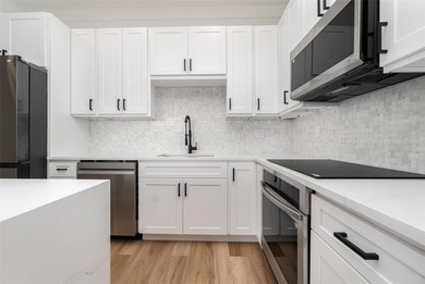 Experience contemporary living in this BRAND-NEW 2025 two-story on Saint Andrews South Golf Club in Florida - for sale on GolfHomes.com, golf home, golf lot