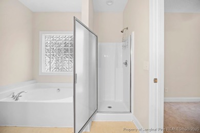 Step inside this charming 3-bedroom, 2-bath home featuring a on Carolina Lakes Country Club in North Carolina - for sale on GolfHomes.com, golf home, golf lot