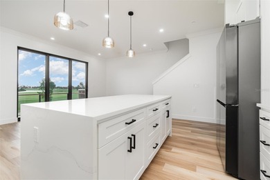 Experience contemporary living in this BRAND-NEW 2025 two-story on Saint Andrews South Golf Club in Florida - for sale on GolfHomes.com, golf home, golf lot
