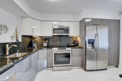 Beautiful corner unit, completely renovated, impact windows 3/8 on Marina Lakes Golf Course in Florida - for sale on GolfHomes.com, golf home, golf lot
