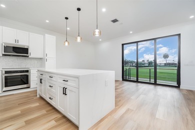 Experience contemporary living in this BRAND-NEW 2025 two-story on Saint Andrews South Golf Club in Florida - for sale on GolfHomes.com, golf home, golf lot