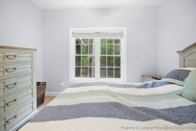 Step inside this charming 3-bedroom, 2-bath home featuring a on Carolina Lakes Country Club in North Carolina - for sale on GolfHomes.com, golf home, golf lot