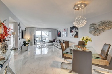 Beautiful corner unit, completely renovated, impact windows 3/8 on Marina Lakes Golf Course in Florida - for sale on GolfHomes.com, golf home, golf lot