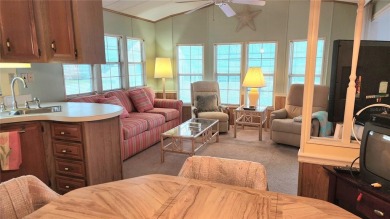 START ENJOYING FLORIDA IN THIS WELL-KEPT ONE BEDROOM, TWO on River Run Golf Links in Florida - for sale on GolfHomes.com, golf home, golf lot