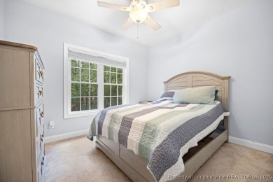Step inside this charming 3-bedroom, 2-bath home featuring a on Carolina Lakes Country Club in North Carolina - for sale on GolfHomes.com, golf home, golf lot