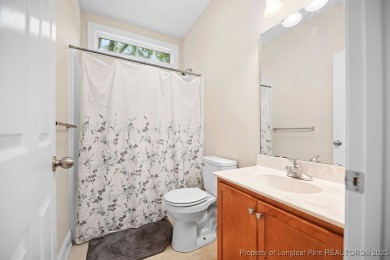 Step inside this charming 3-bedroom, 2-bath home featuring a on Carolina Lakes Country Club in North Carolina - for sale on GolfHomes.com, golf home, golf lot