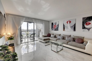 Beautiful corner unit, completely renovated, impact windows 3/8 on Marina Lakes Golf Course in Florida - for sale on GolfHomes.com, golf home, golf lot