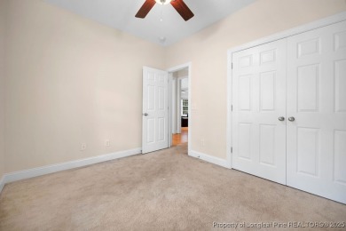 Step inside this charming 3-bedroom, 2-bath home featuring a on Carolina Lakes Country Club in North Carolina - for sale on GolfHomes.com, golf home, golf lot
