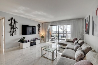 Beautiful corner unit, completely renovated, impact windows 3/8 on Marina Lakes Golf Course in Florida - for sale on GolfHomes.com, golf home, golf lot