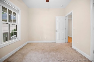 Step inside this charming 3-bedroom, 2-bath home featuring a on Carolina Lakes Country Club in North Carolina - for sale on GolfHomes.com, golf home, golf lot