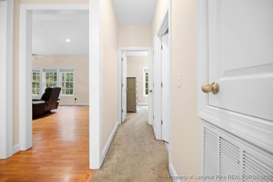 Step inside this charming 3-bedroom, 2-bath home featuring a on Carolina Lakes Country Club in North Carolina - for sale on GolfHomes.com, golf home, golf lot