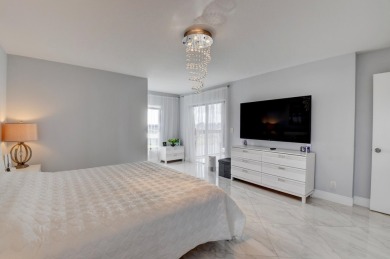 Beautiful corner unit, completely renovated, impact windows 3/8 on Marina Lakes Golf Course in Florida - for sale on GolfHomes.com, golf home, golf lot