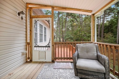 Step inside this charming 3-bedroom, 2-bath home featuring a on Carolina Lakes Country Club in North Carolina - for sale on GolfHomes.com, golf home, golf lot