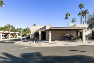 Step into this beautifully updated, move-in-ready end unit in on Fountain of the Sun Country Club in Arizona - for sale on GolfHomes.com, golf home, golf lot
