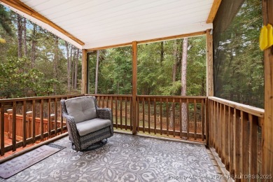 Step inside this charming 3-bedroom, 2-bath home featuring a on Carolina Lakes Country Club in North Carolina - for sale on GolfHomes.com, golf home, golf lot
