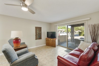 Step into this beautifully updated, move-in-ready end unit in on Fountain of the Sun Country Club in Arizona - for sale on GolfHomes.com, golf home, golf lot